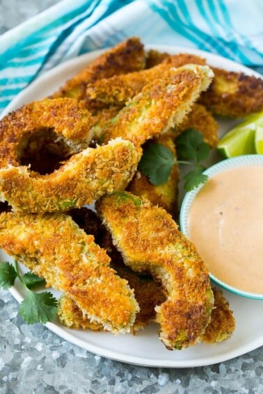 This recipe for avocado fries is slices of avocado that are breaded and lightly fried to crispy golden brown perfection. The ultimate appetizer or side dish for avocado lovers!