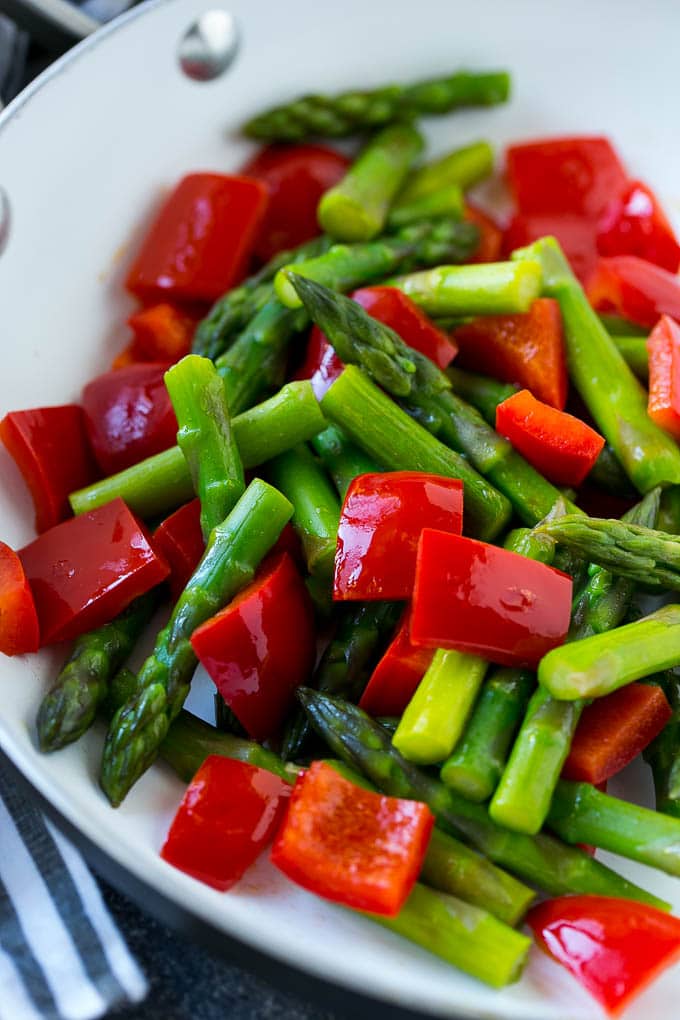 Sauteed vegetables like asparagus and red bell peppers form the base of this teriyaki chicken stir fry.