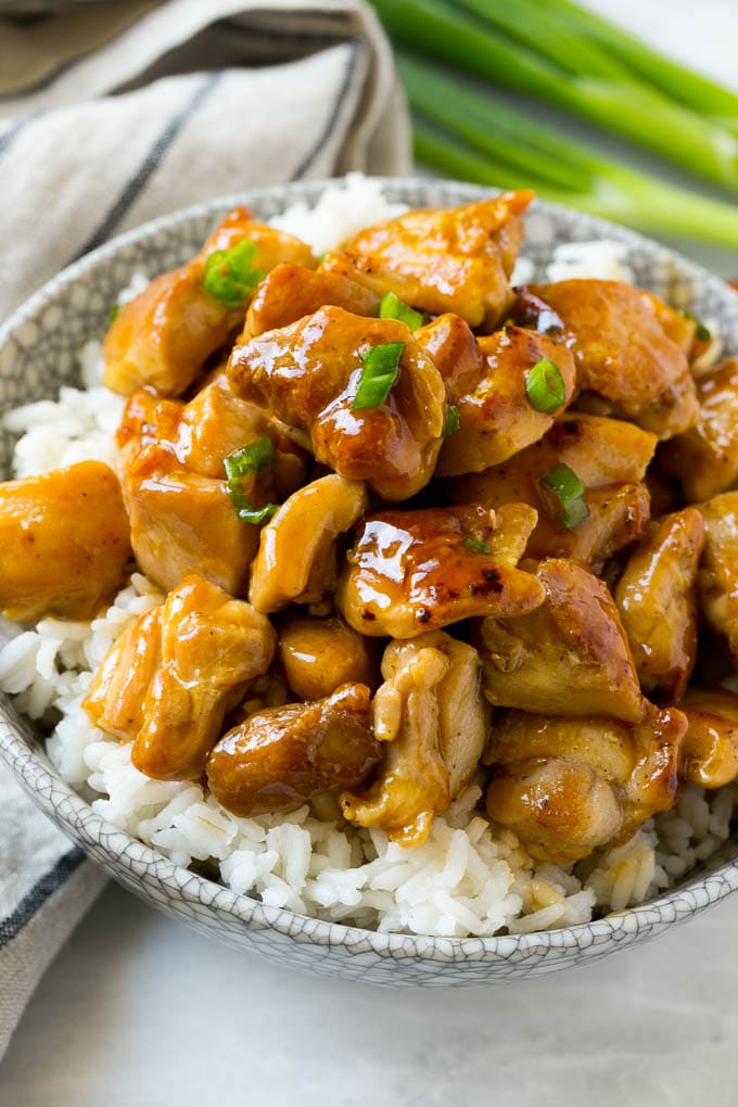 Sweet and savory chicken served over a bowl of rice.