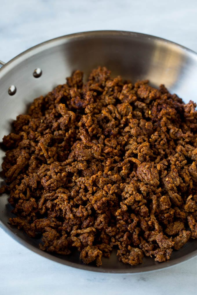 Taco meat in a skillet.