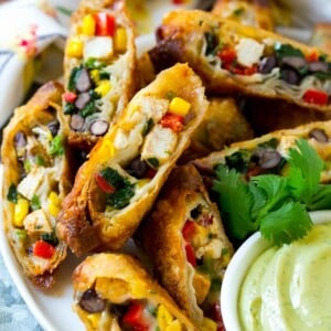 These southwestern egg rolls are loaded with a colorful variety of vegetables, chicken, beans and plenty of melty cheese, all wrapped up in a crispy roll. The ultimate party appetizer!