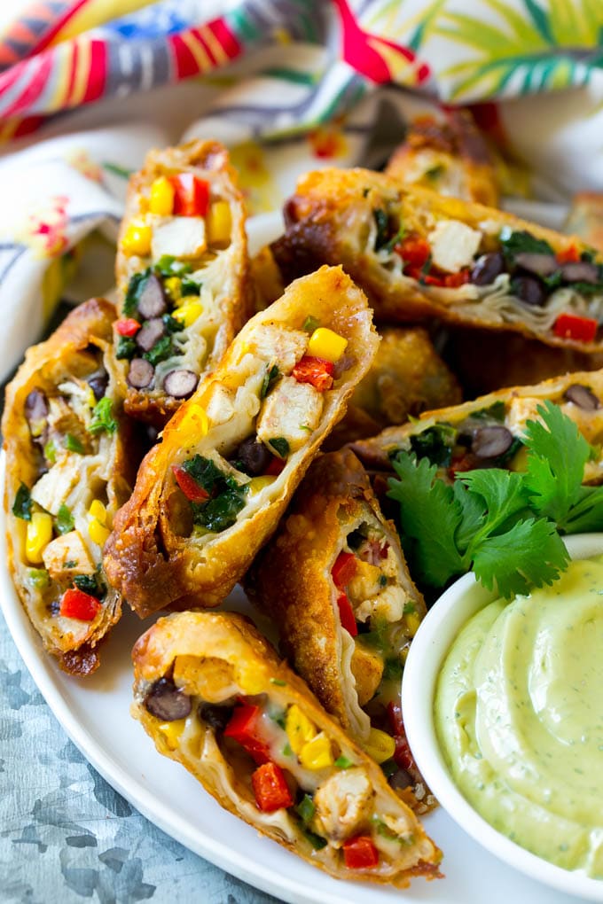 Southwestern egg rolls filled with chicken, beans, peppers, corn and cheese.