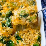 A spoonful of cheesy broccoli casserole