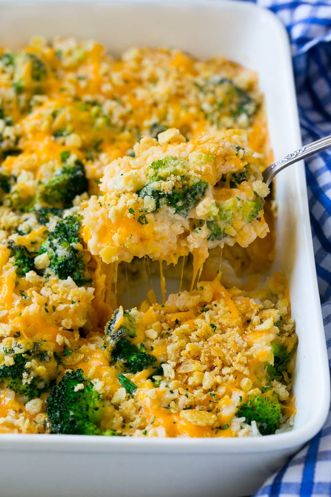 A spoonful of broccoli and cheese casserole.