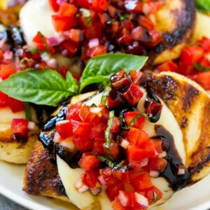 Grilled bruschetta chicken topped with melted mozzarella cheese, tomato basil bruschetta and a drizzle of balsamic glaze.