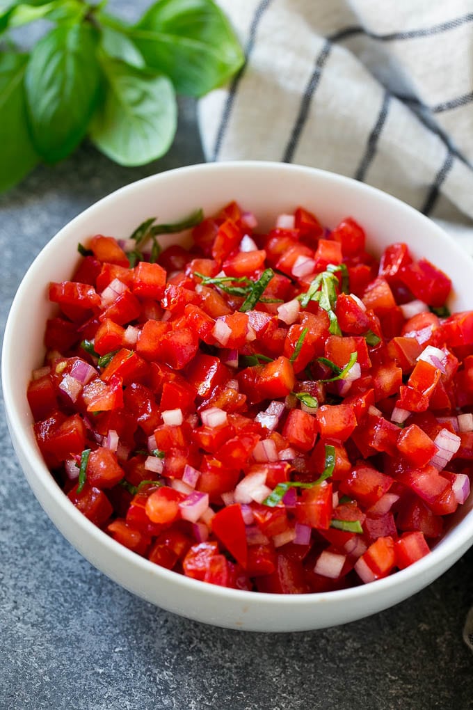 A bowl of tomato bruschetta.