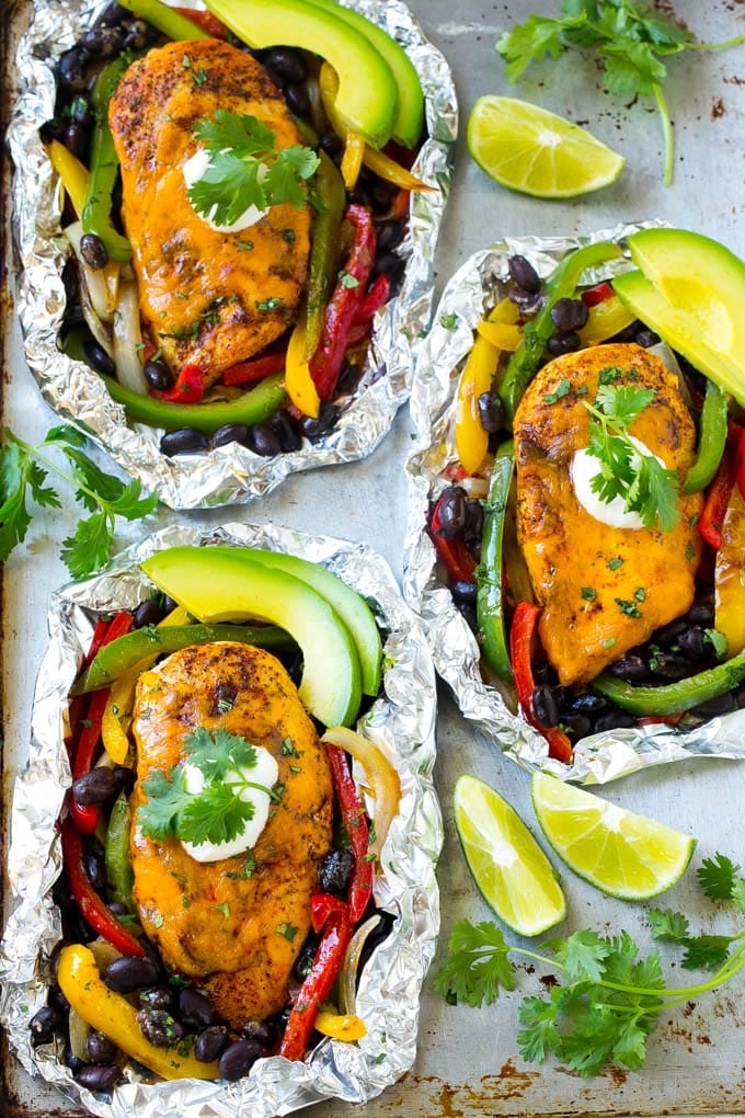 A tray of fajita chicken foil packets.