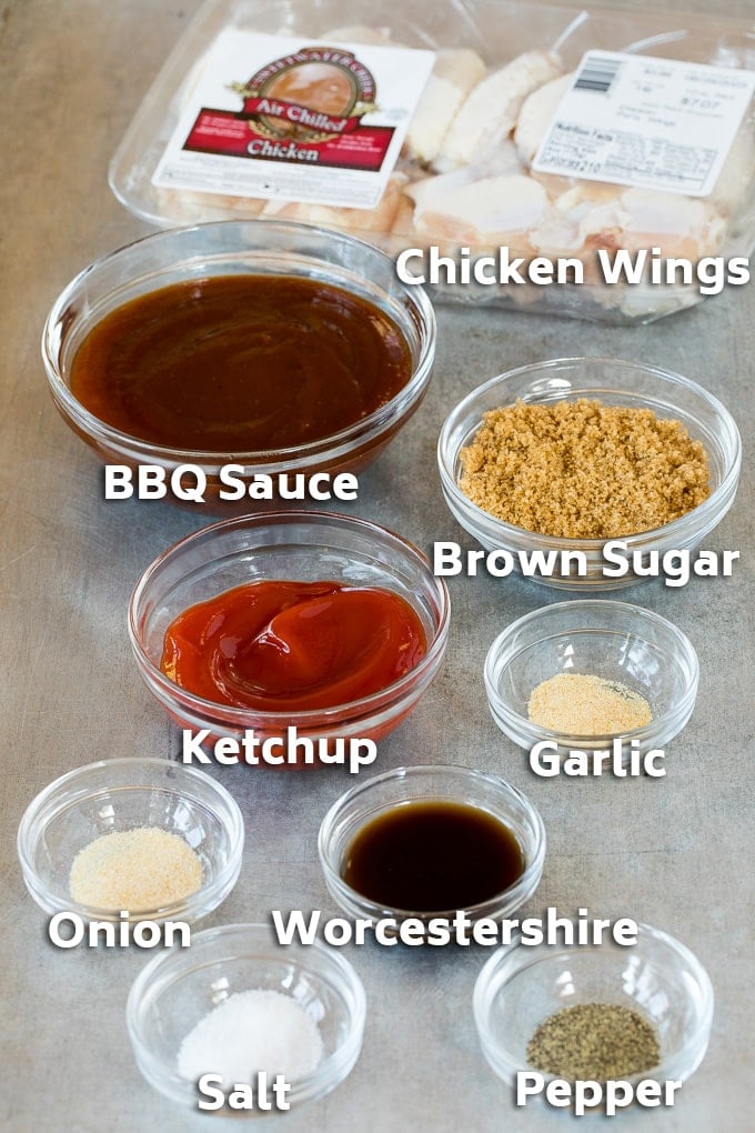 Bowls of ingredients including BBQ sauce, spices and seasonings.