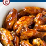 These slow cooker chicken wings are simmered in the crock pot in a savory sauce, then broiled to crispy perfection.
