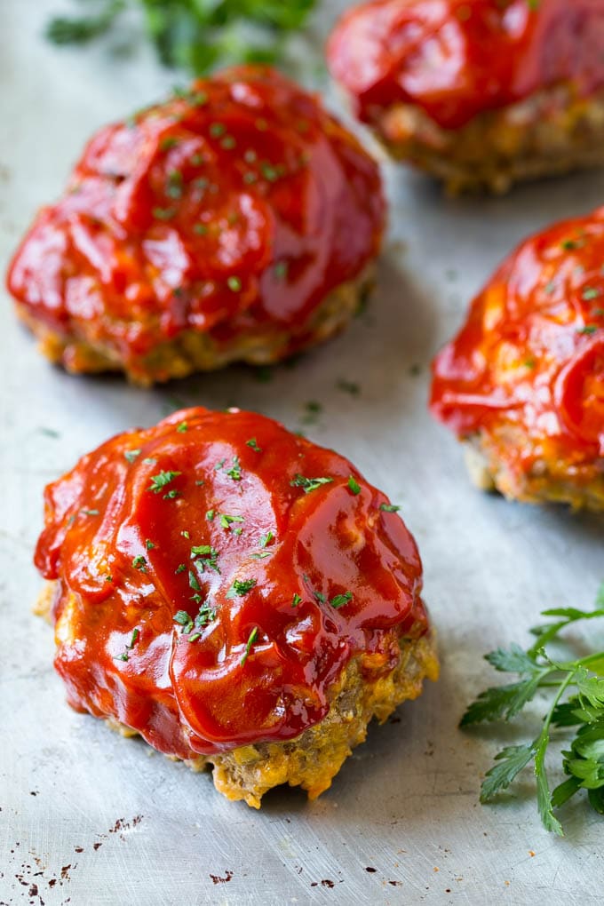 A tray of individual meatloaves.