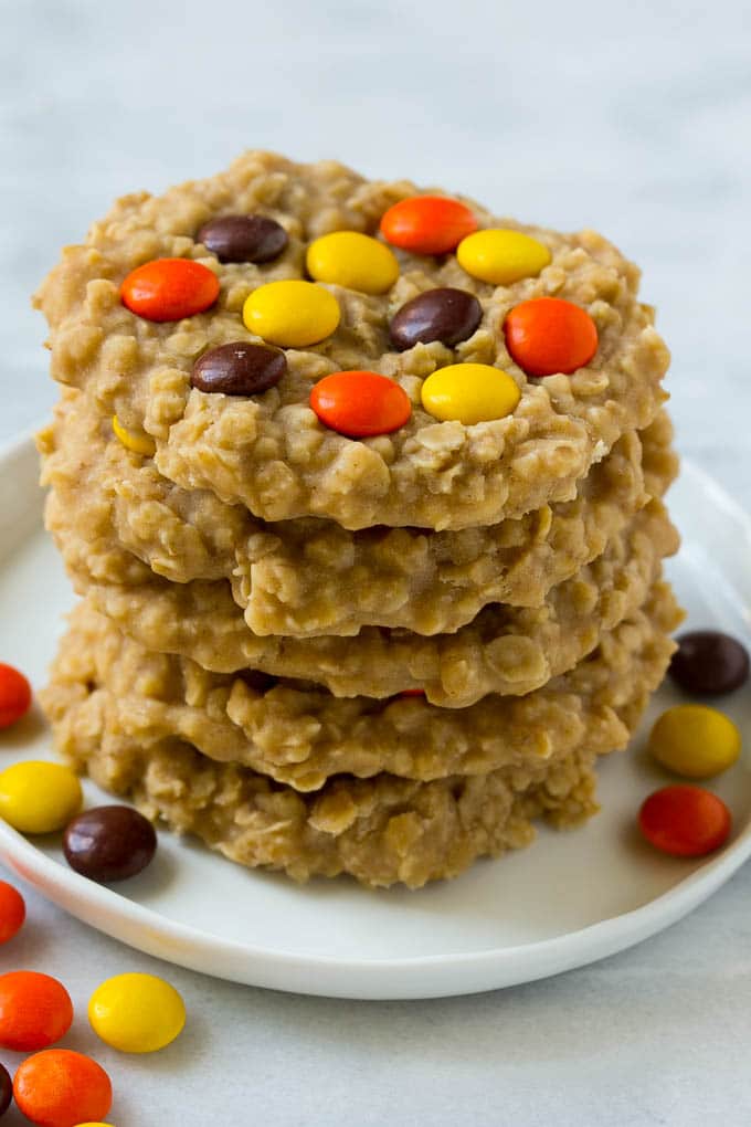 A plate with a stack of no bake peanut butter cookies.