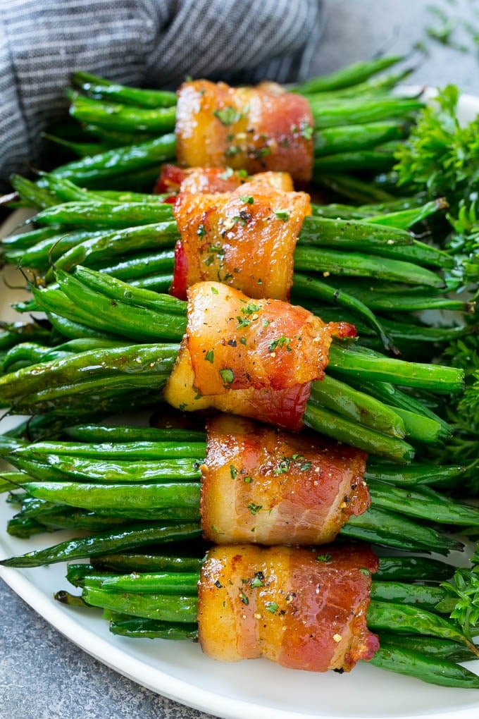 Green bean bundles wrapped in bacon.