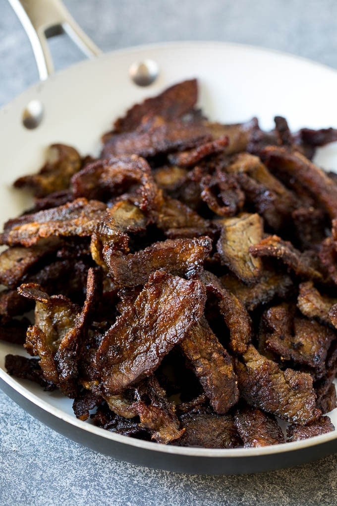 Seared crispy flank steak pieces.