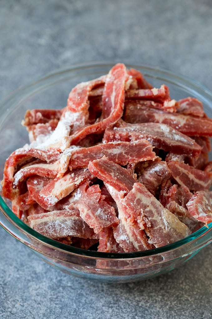 Thinly sliced steak coated in cornstarch.