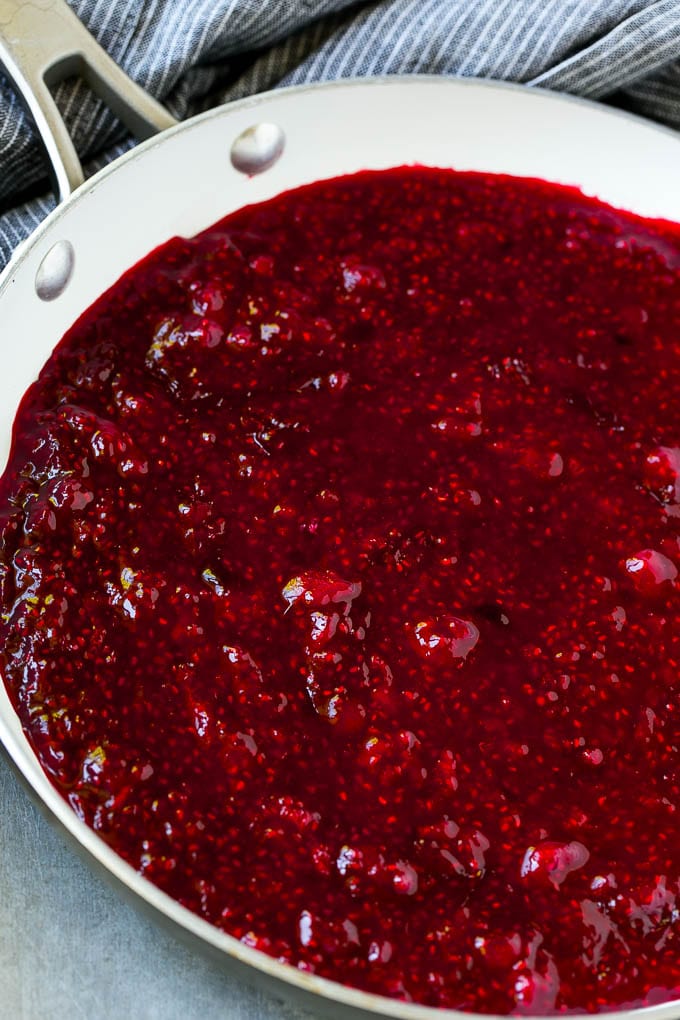 Easy raspberry sauce in a skillet.