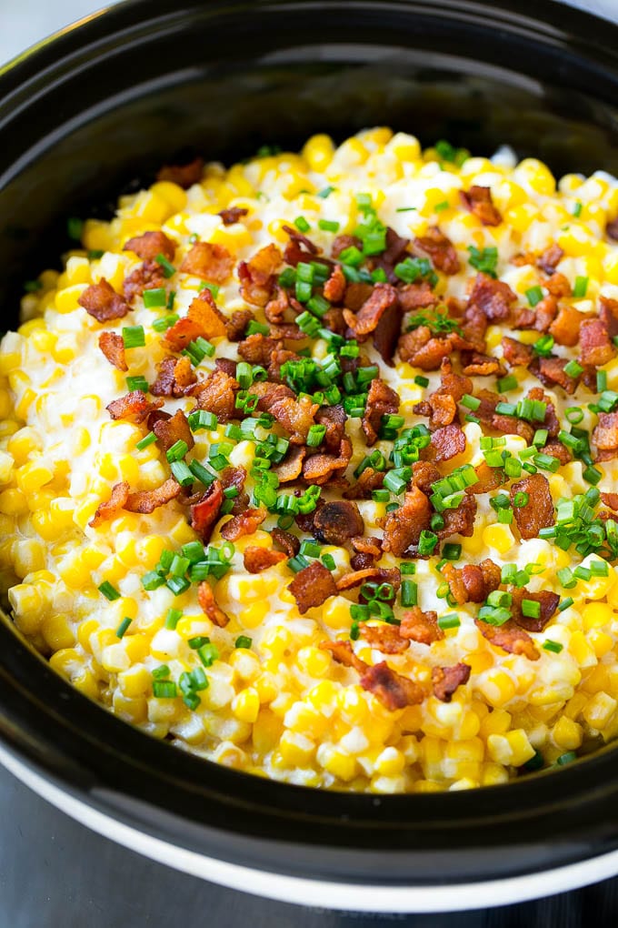 Slow cooker creamed corn with Bacon and sliced chives.