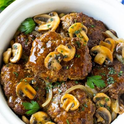 Slow cooker salisbury steak with mushroom gravy and onions.