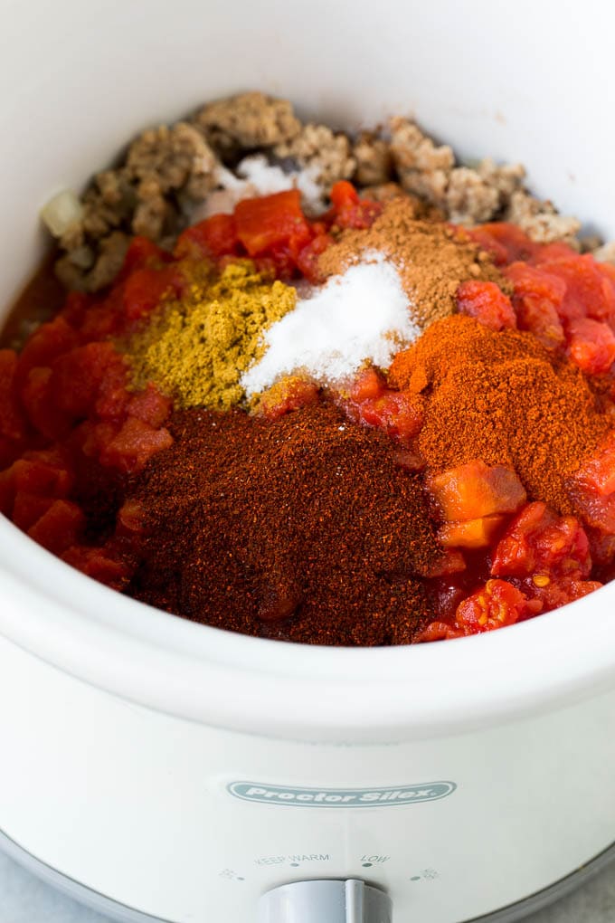 Turkey, tomatoes and spices in a crockpot.