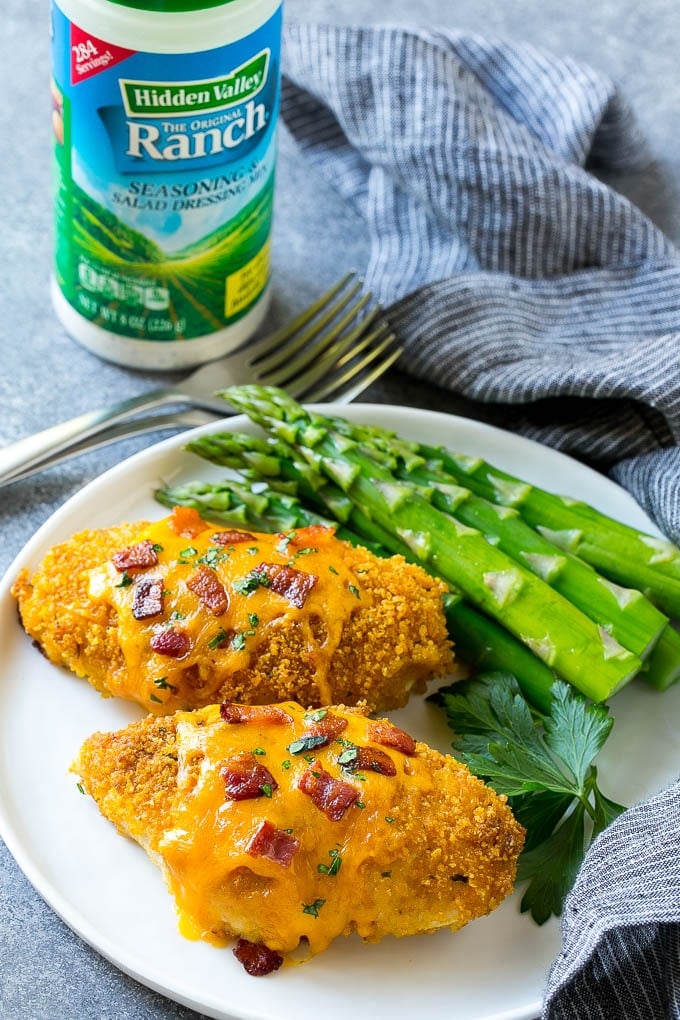 Hidden Valley Ranch Chicken on a plate served with asparagus spears.