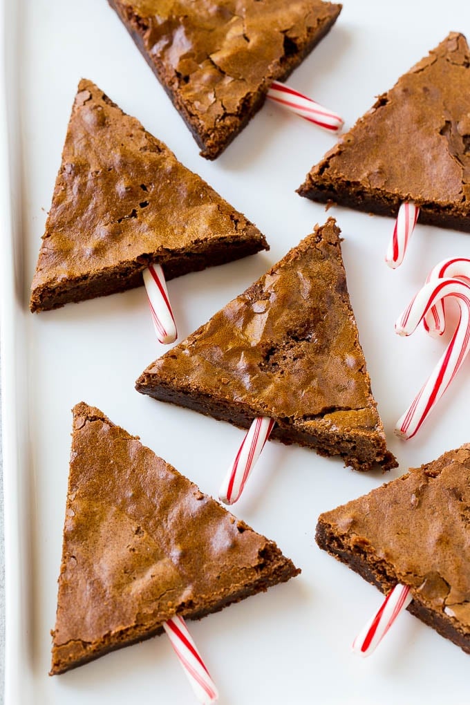 Unfrosted Christmas Tree Brownies with candy cane stems.