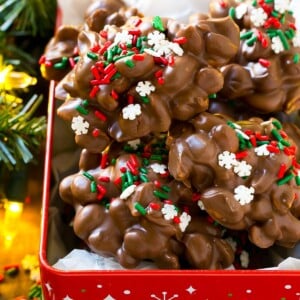 A holiday tin filled with crock pot candy.