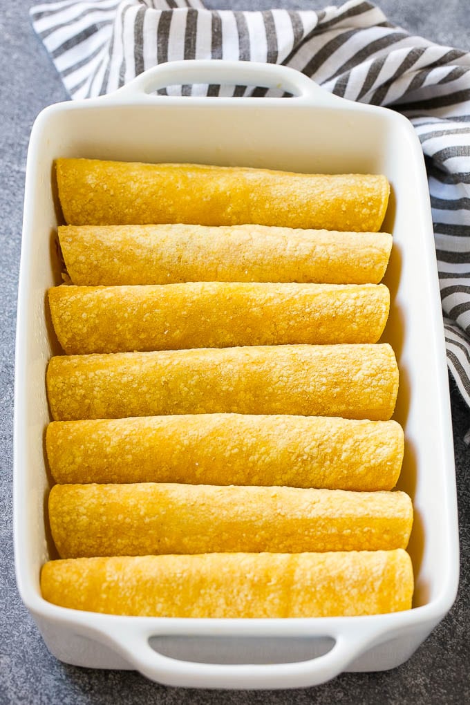 Corn tortillas filled with chicken and rolled up into enchiladas.