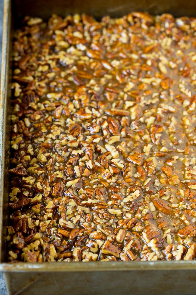 Pecans and brown sugar poured over a cookie crust.