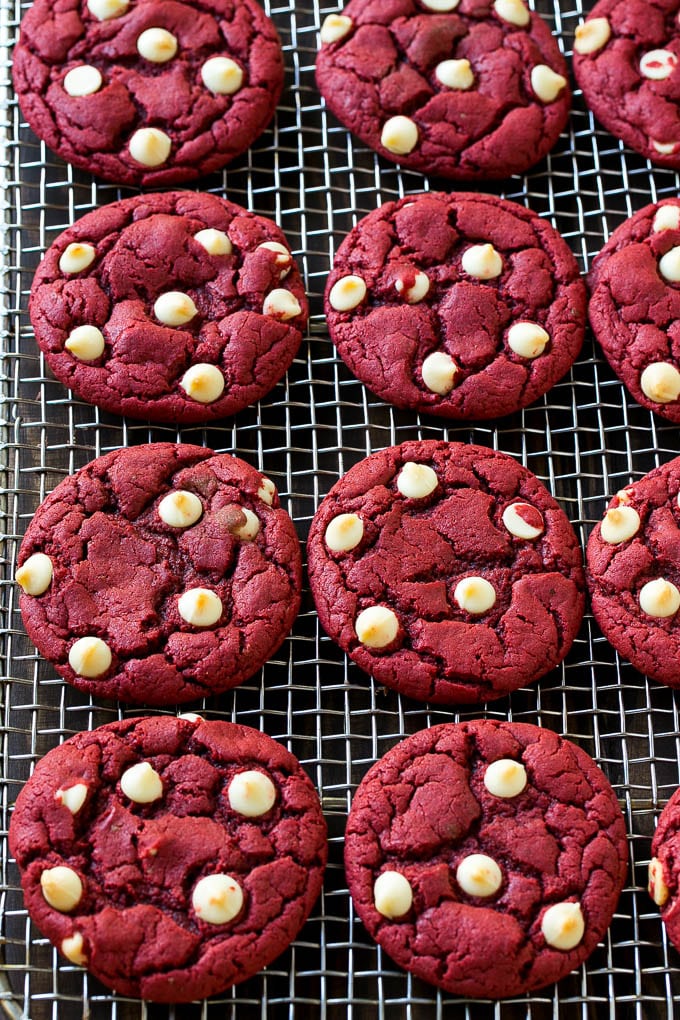 Red Velvet Cookies with White Chocolate Chips on a cooling rack.