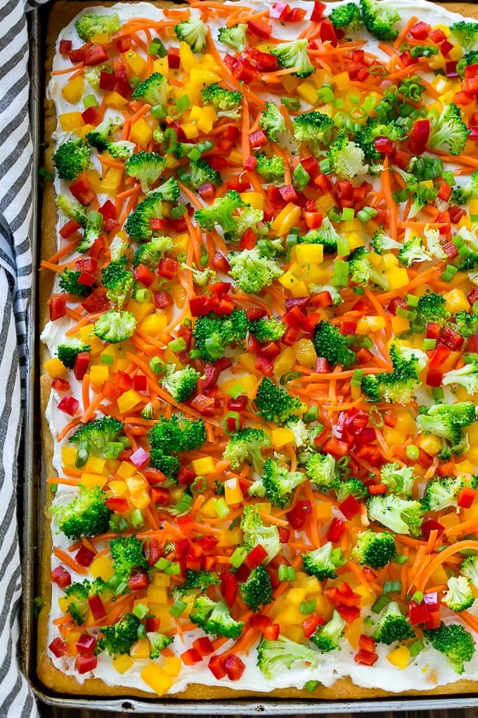 A sheet pan of crescent veggie pizza.