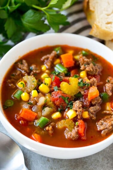 Hamburger soup with potatoes and vegetables is an economical and easy meal option.