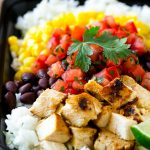 These meal prep burrito bowls taste like they came from a restaurant, but you can easily make them at home and have a healthy and easy lunch all week long! They're full of grilled marinated chicken, cilantro lime rice, black beans, corn and fresh salsa.