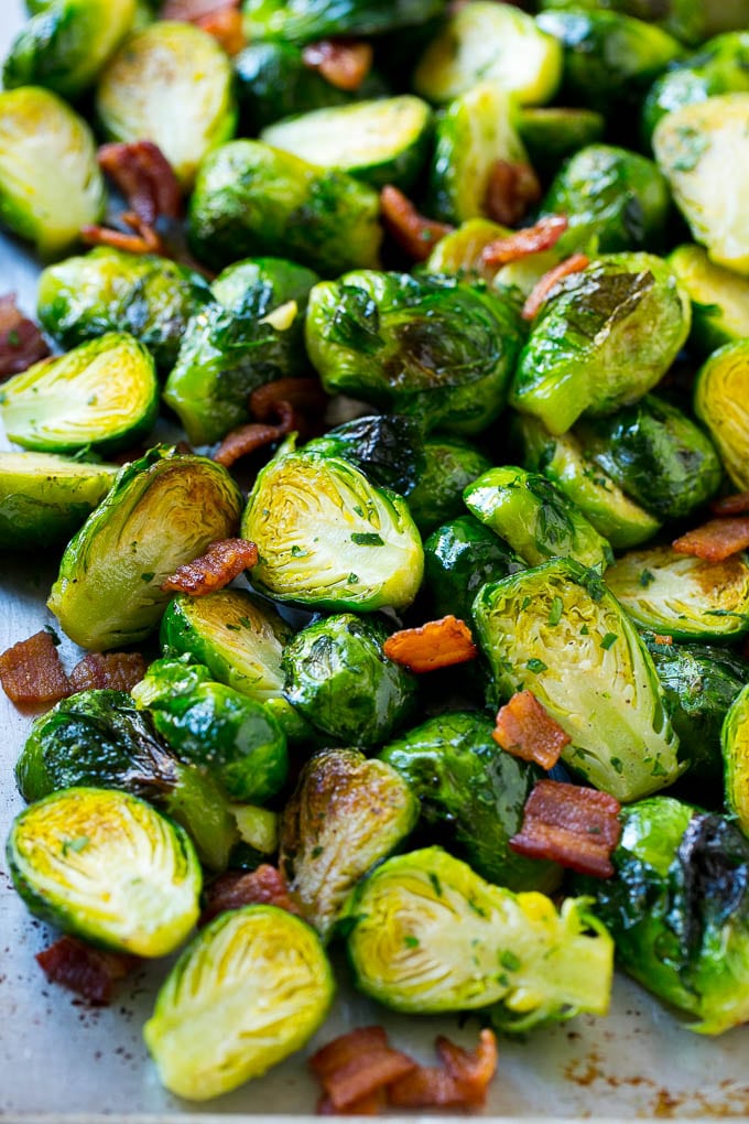 A sheet pan of oven roasted brussels sprouts and bacon.