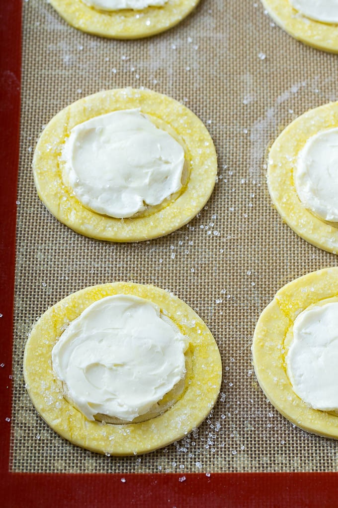 Puff pastry rounds topped with a sweet cream cheese filling.