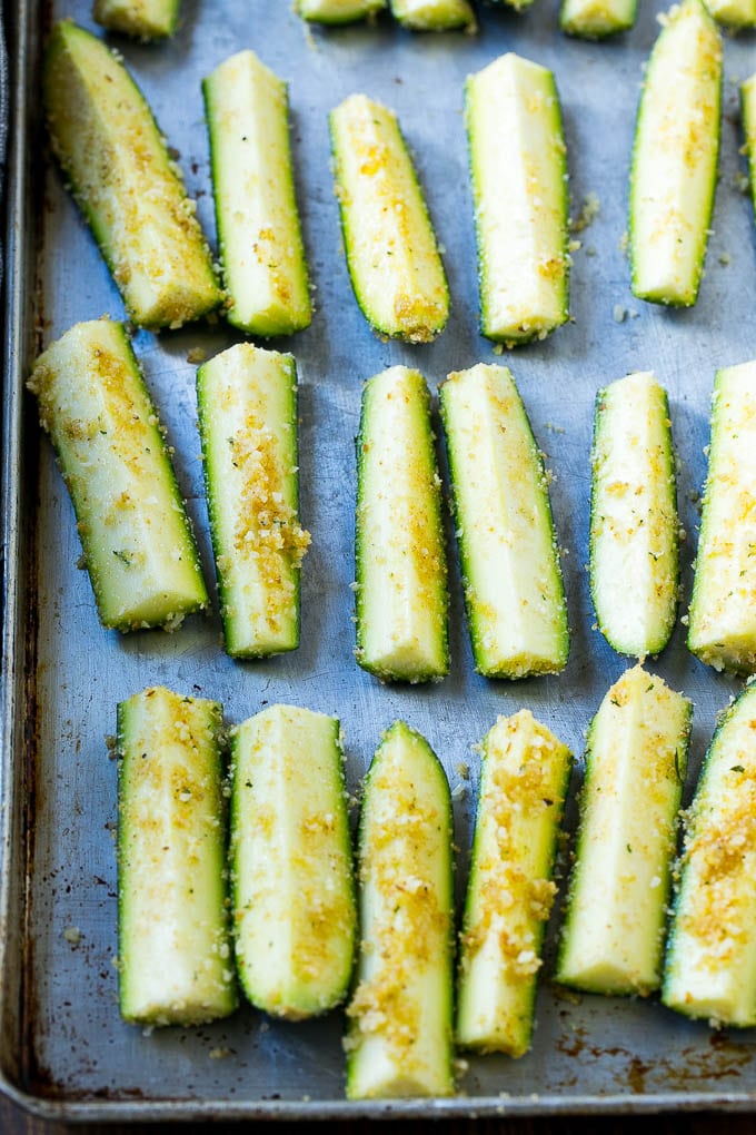 Zucchini sticks coated in parmesan and breadcrumbs.