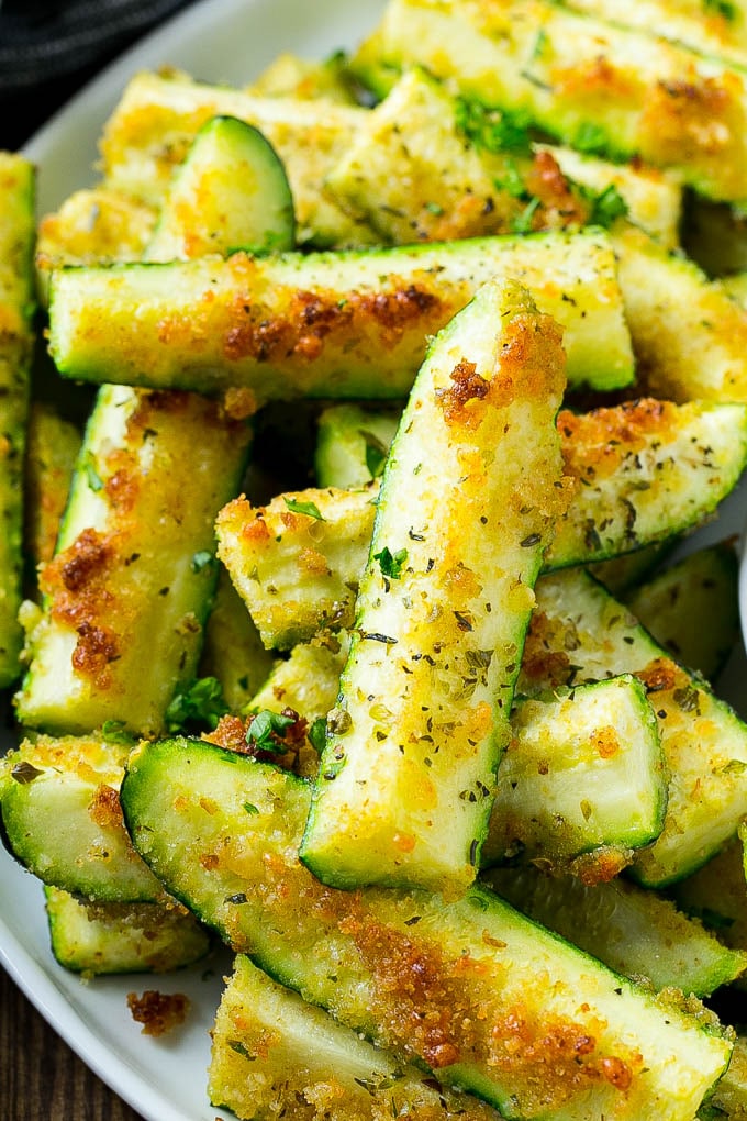 Zucchini sticks coated in parmesan, herbs and breadcrumbs.