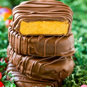 A stack of peanut butter eggs coated in chocolate.