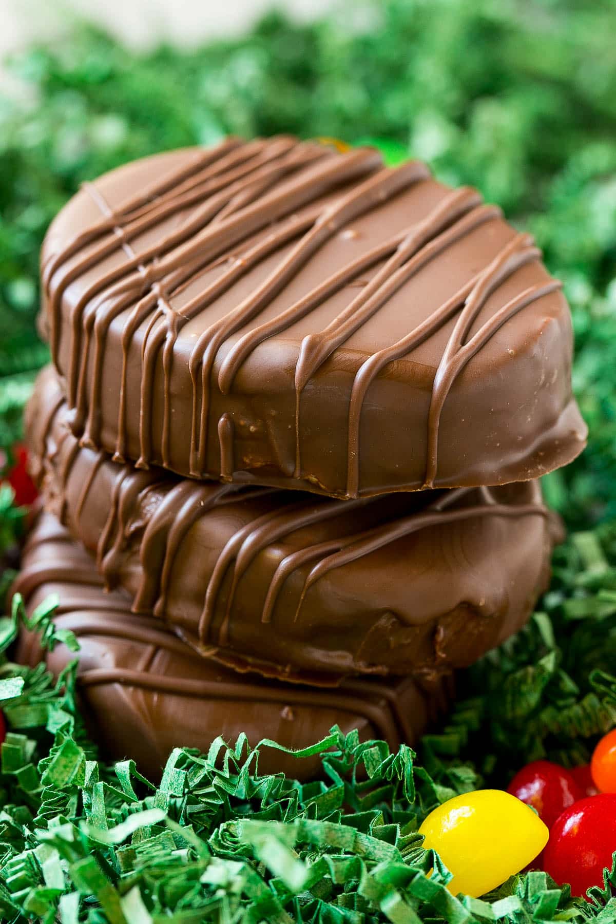 A stack of chocolate covered Reese's eggs.