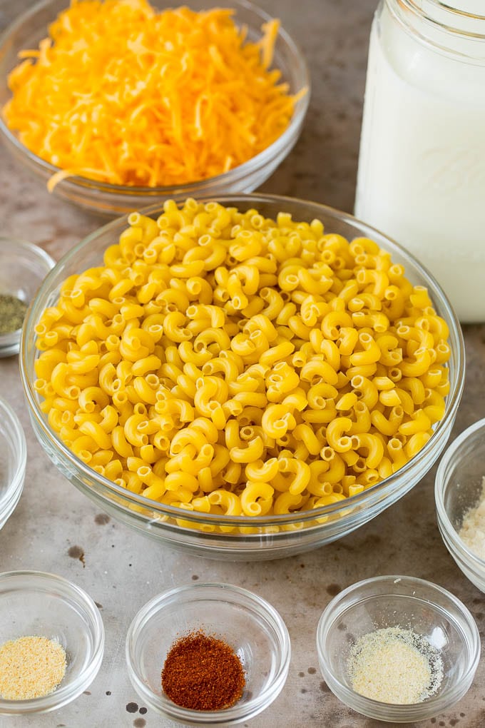 All of the ingredients to make macaroni and cheese.