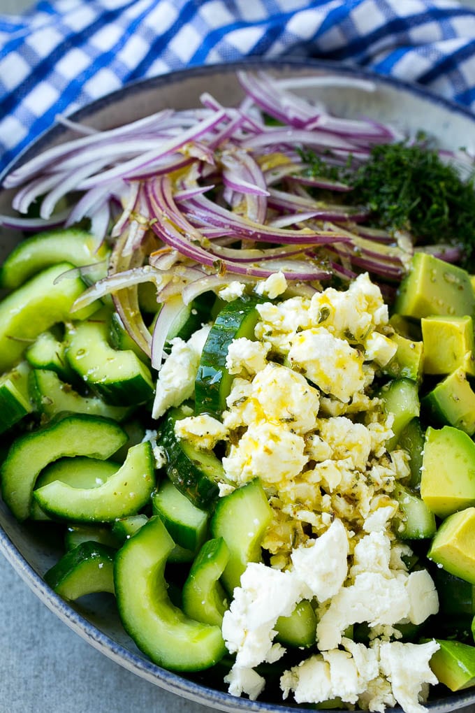 Cucumbers, red onion, feta cheese, dill and avocado topped with Greek dressing.