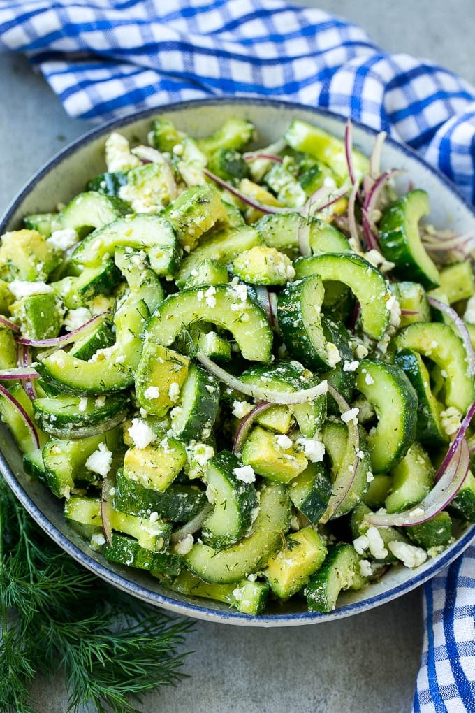 A bowl of cucumber feta salad with avocado.