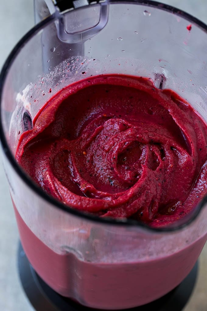 Frozen fruit smoothie in a blender.