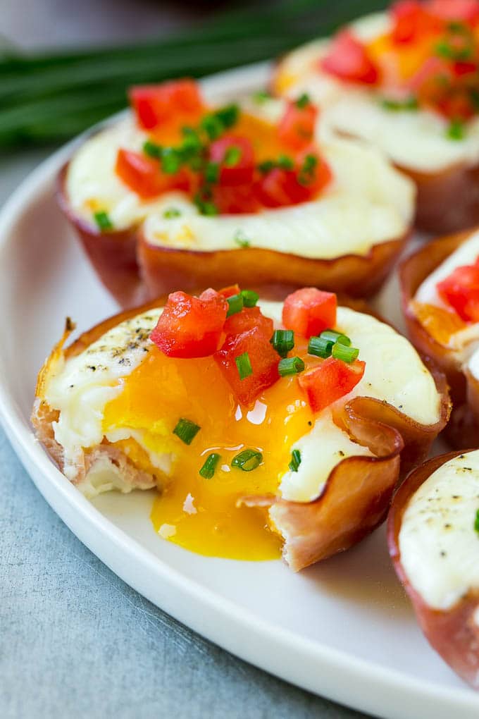 A ham and egg cup with a runny yolk.