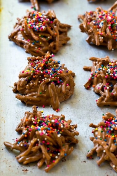Haystack cookies made with chow mein noodles on a baking sheet.