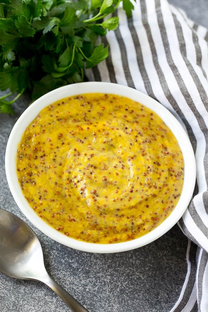 A bowl of honey mustard sauce.