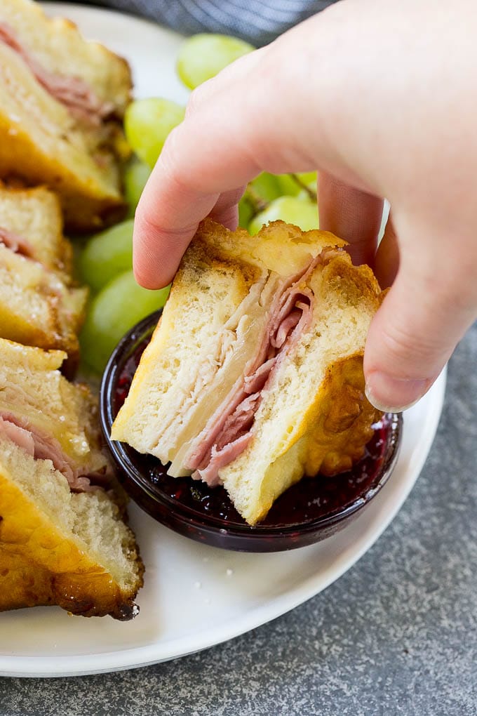 Monte Cristo Sandwich dipped in raspberry jam.