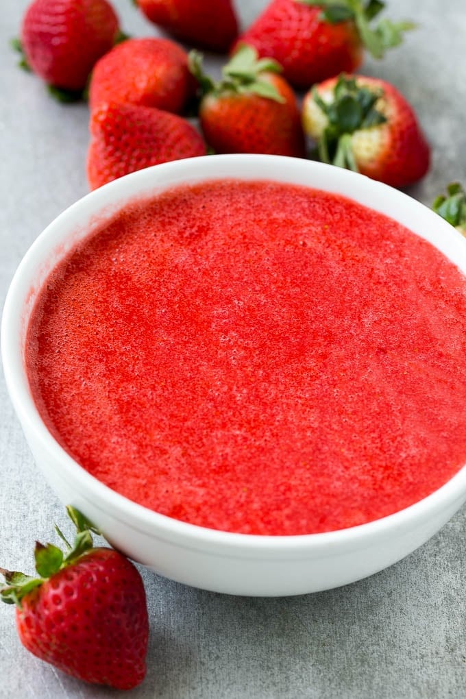 A bowl of strawberry puree.