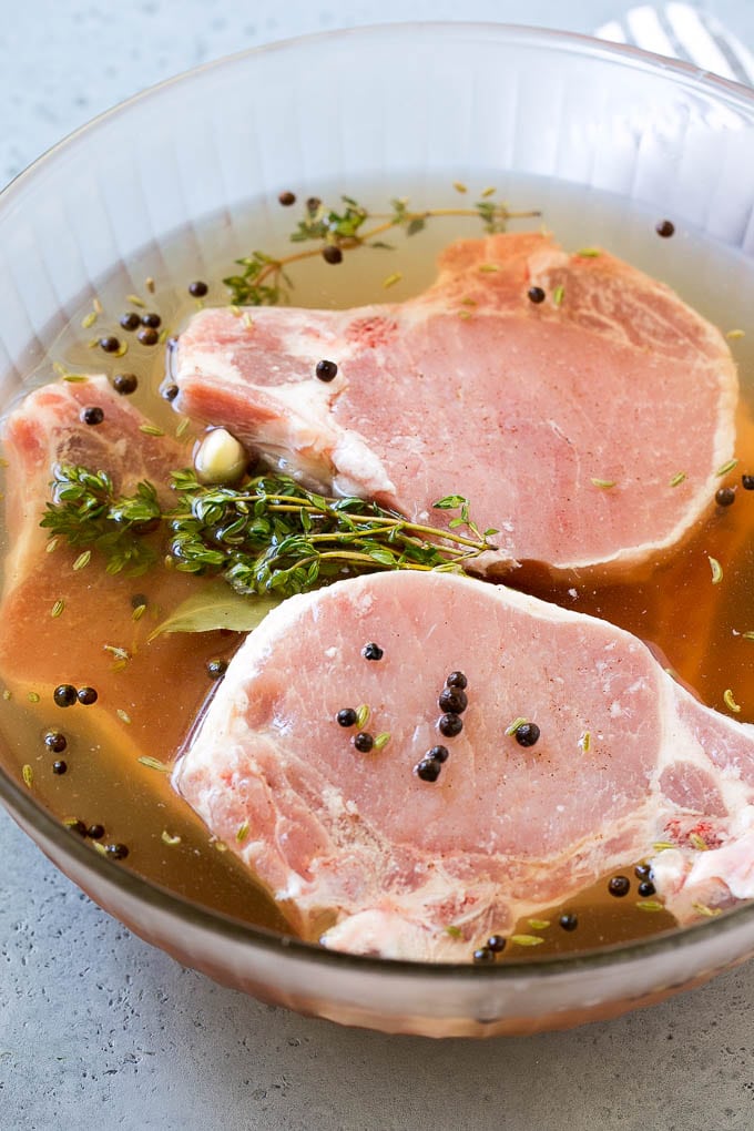 Pork chops in a brine solution.