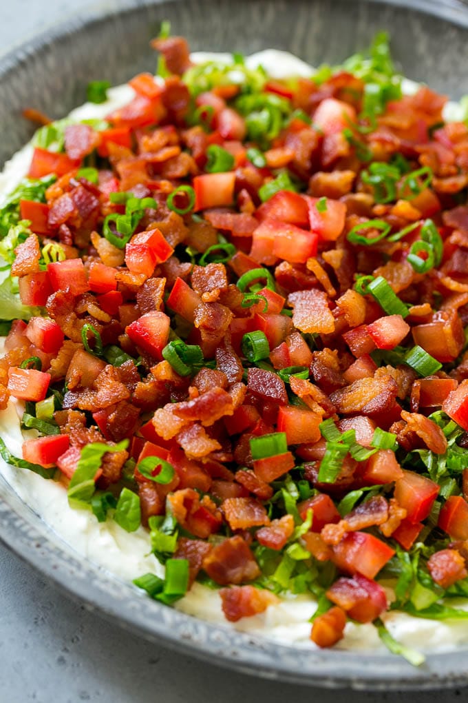 BLT dip with a creamy ranch base, lettuce, tomatoes and bacon.