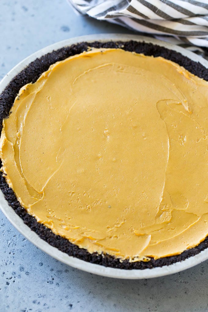 Peanut butter filling inside a chocolate cookie crust.