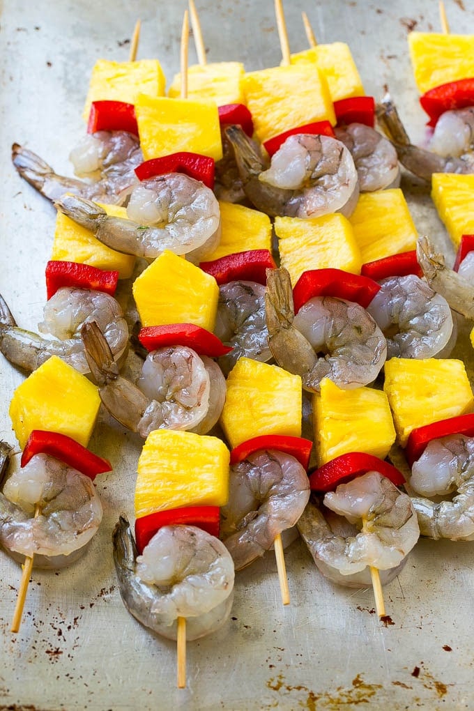 Shrimp, pineapple and peppers on skewers.